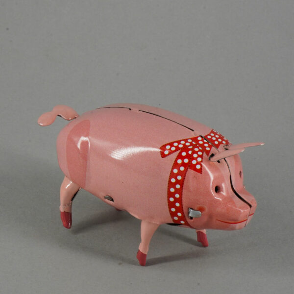 Polly Pig wind up tin toy