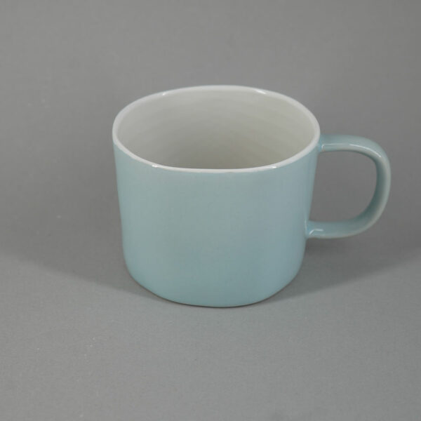 Light blue hand painted stoneware mug